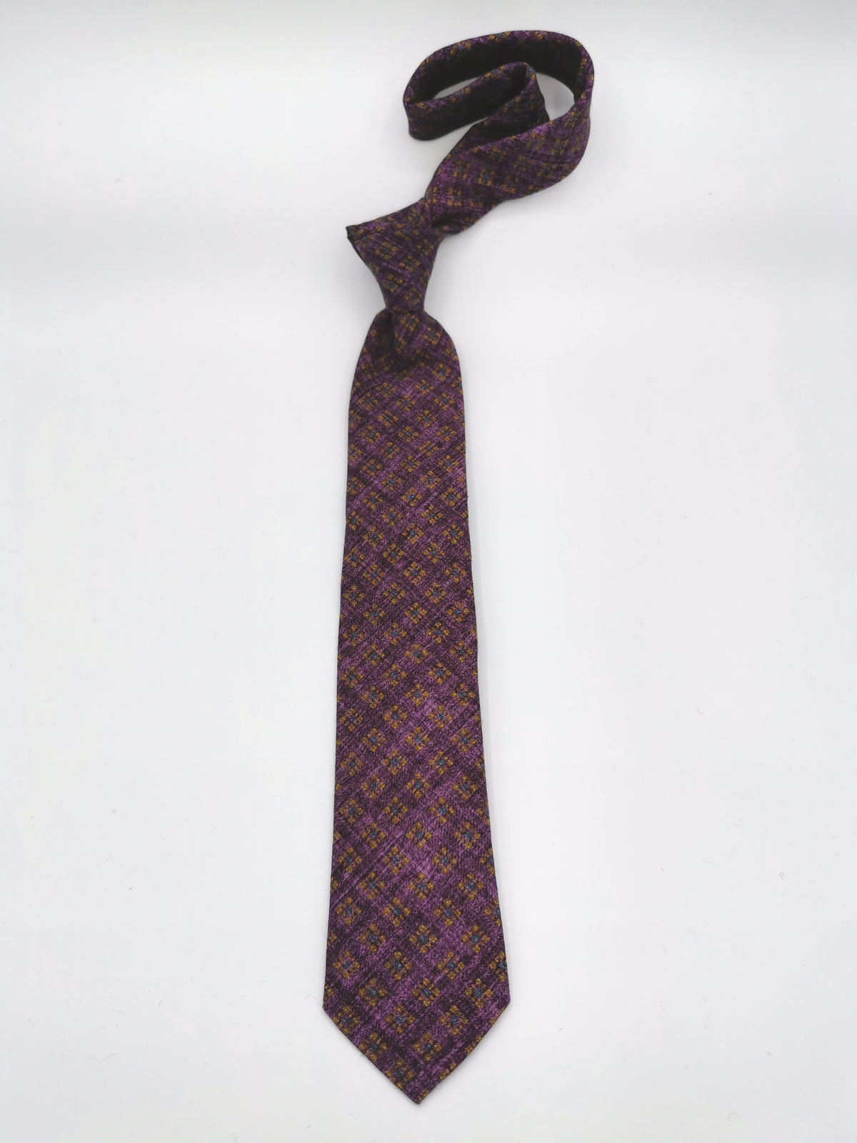 Ferala tie in cotton/wool with ocher flowers