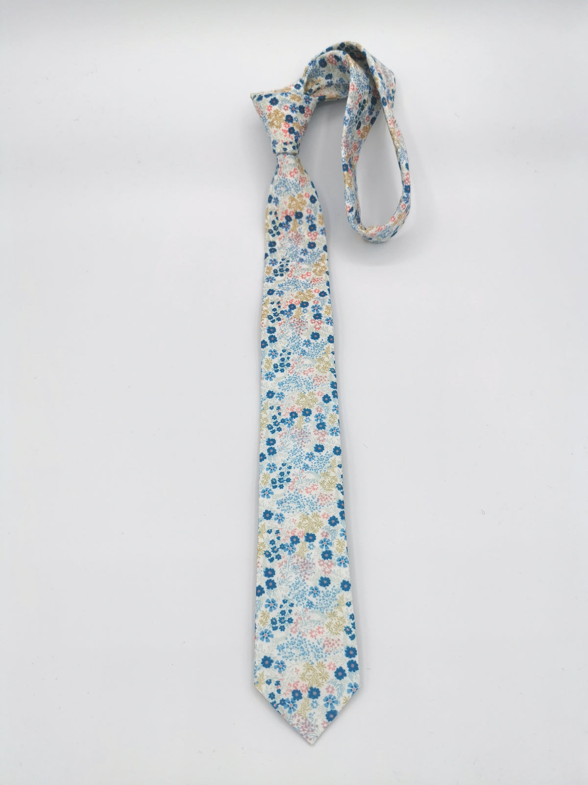 Fine cotton tie with light blue and pink floral pattern