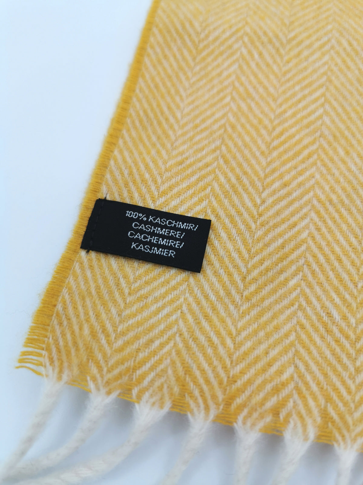 Herringbone cashmere scarf with white fringes