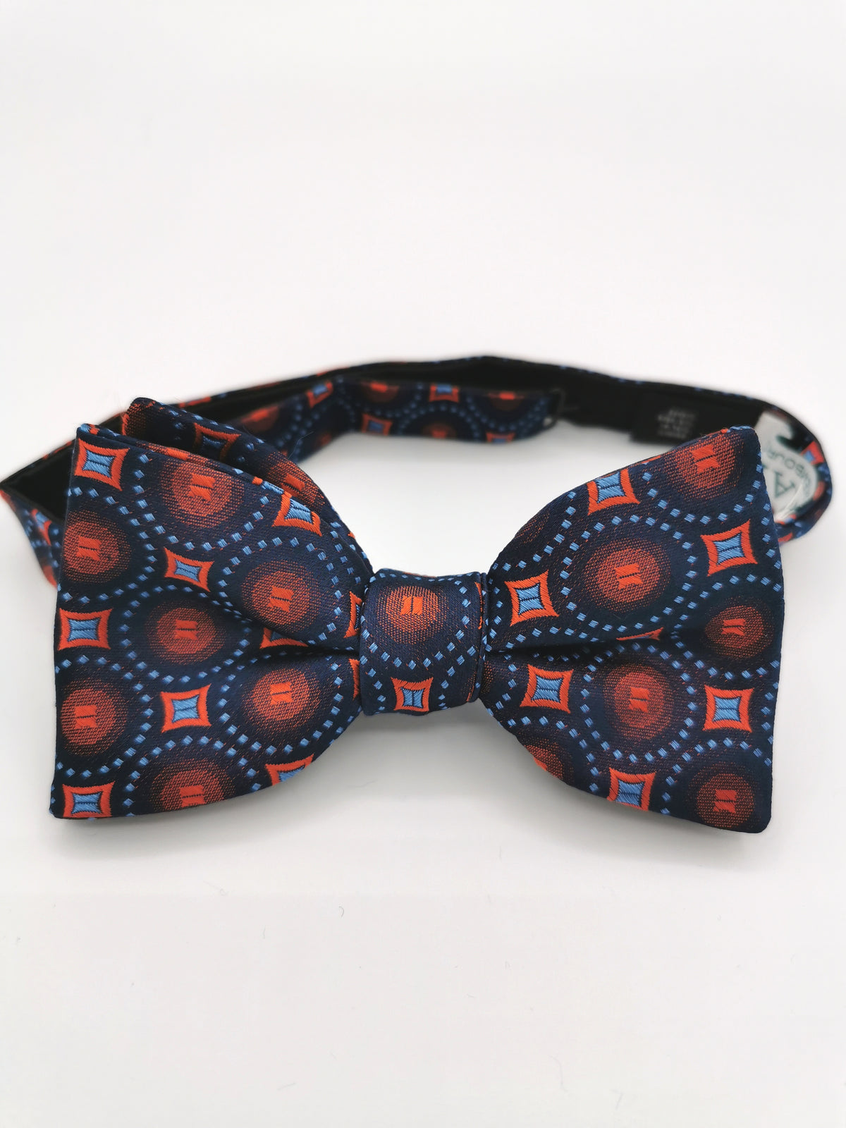 Ferala silk bow tie with circles and orange diamonds