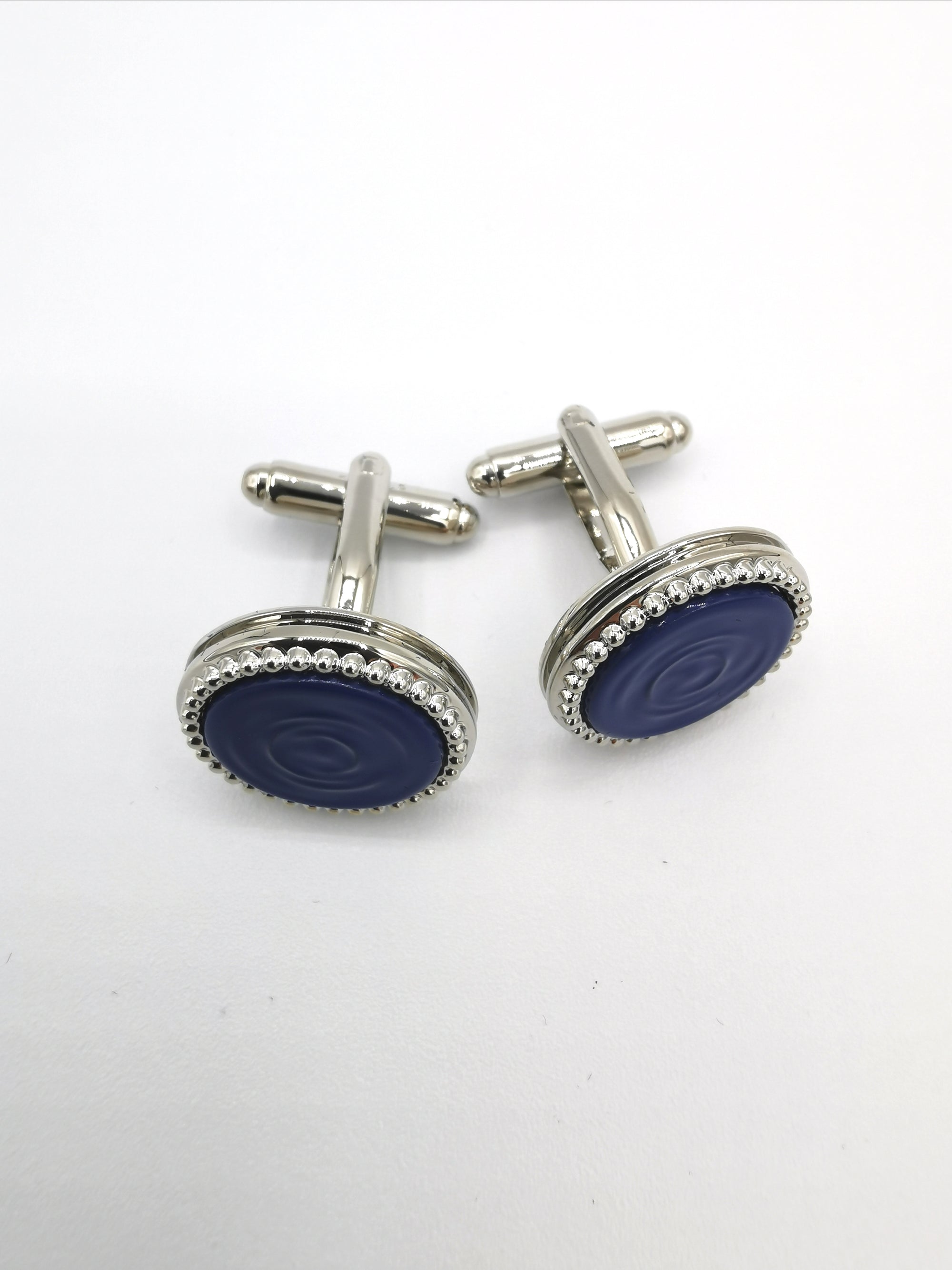 <p>Blue enamel cufflinks</p>