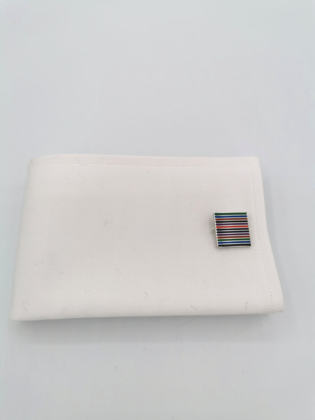 &lt;p&gt;Rainbow cufflinks&lt;/p&gt;