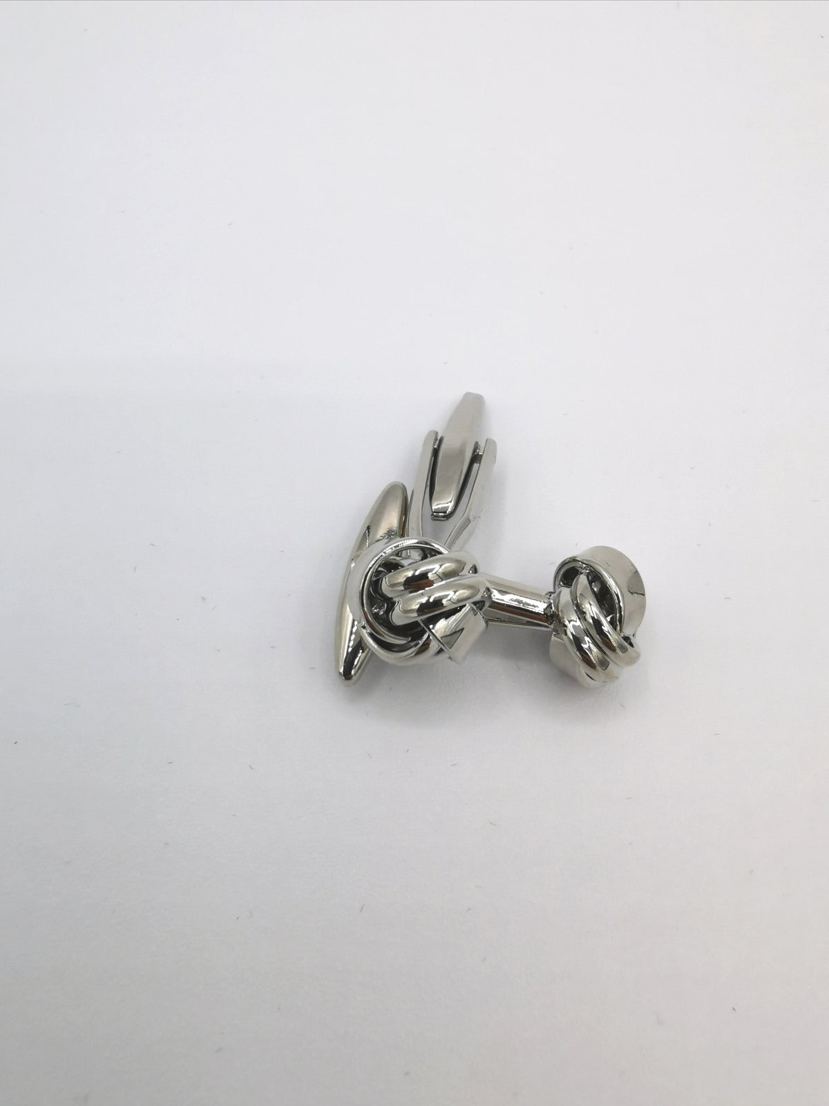 &lt;p&gt;&quot;Knot&quot; cufflinks&lt;/p&gt;