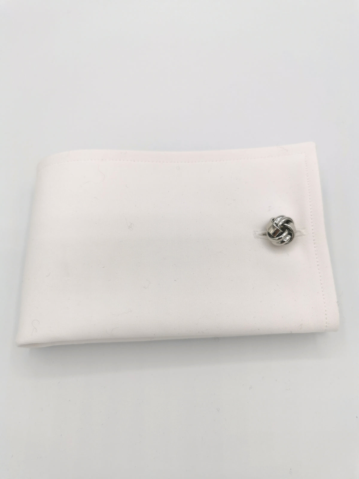 &lt;p&gt;&quot;Knot&quot; cufflinks&lt;/p&gt;