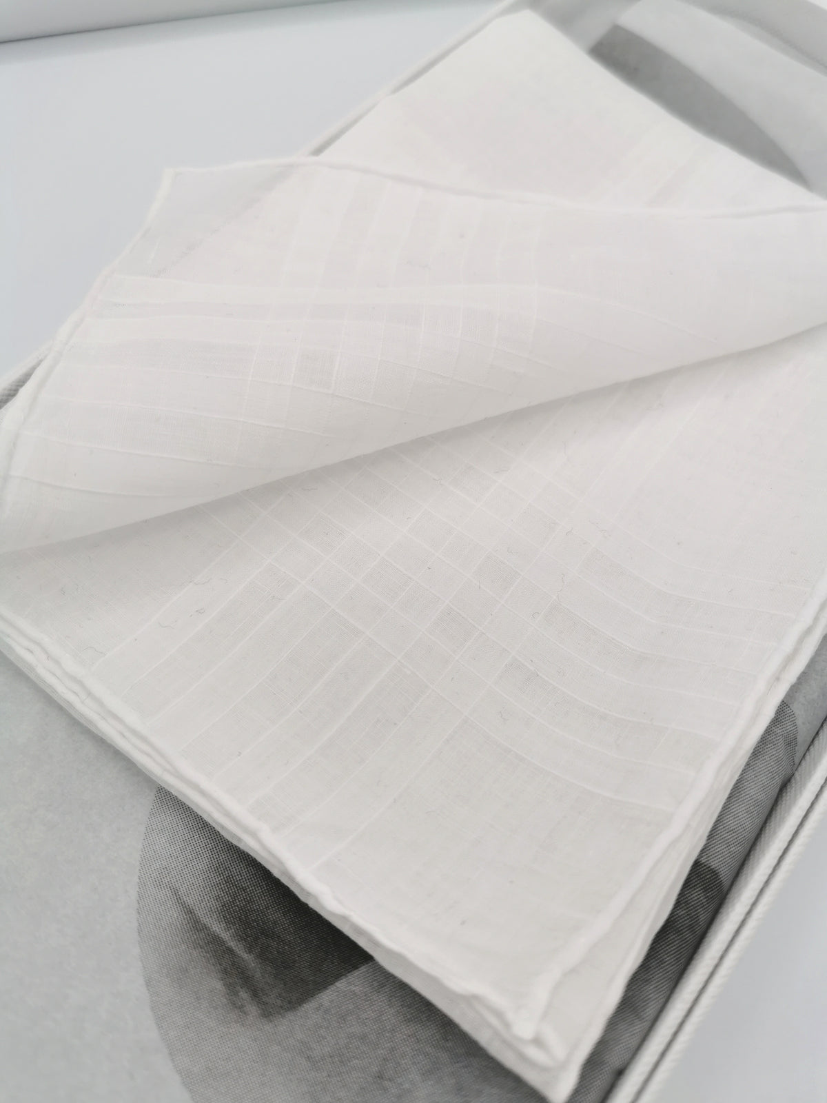 White Simonnot-Godard pocket square with four woven bands on the edges, Archives Collection