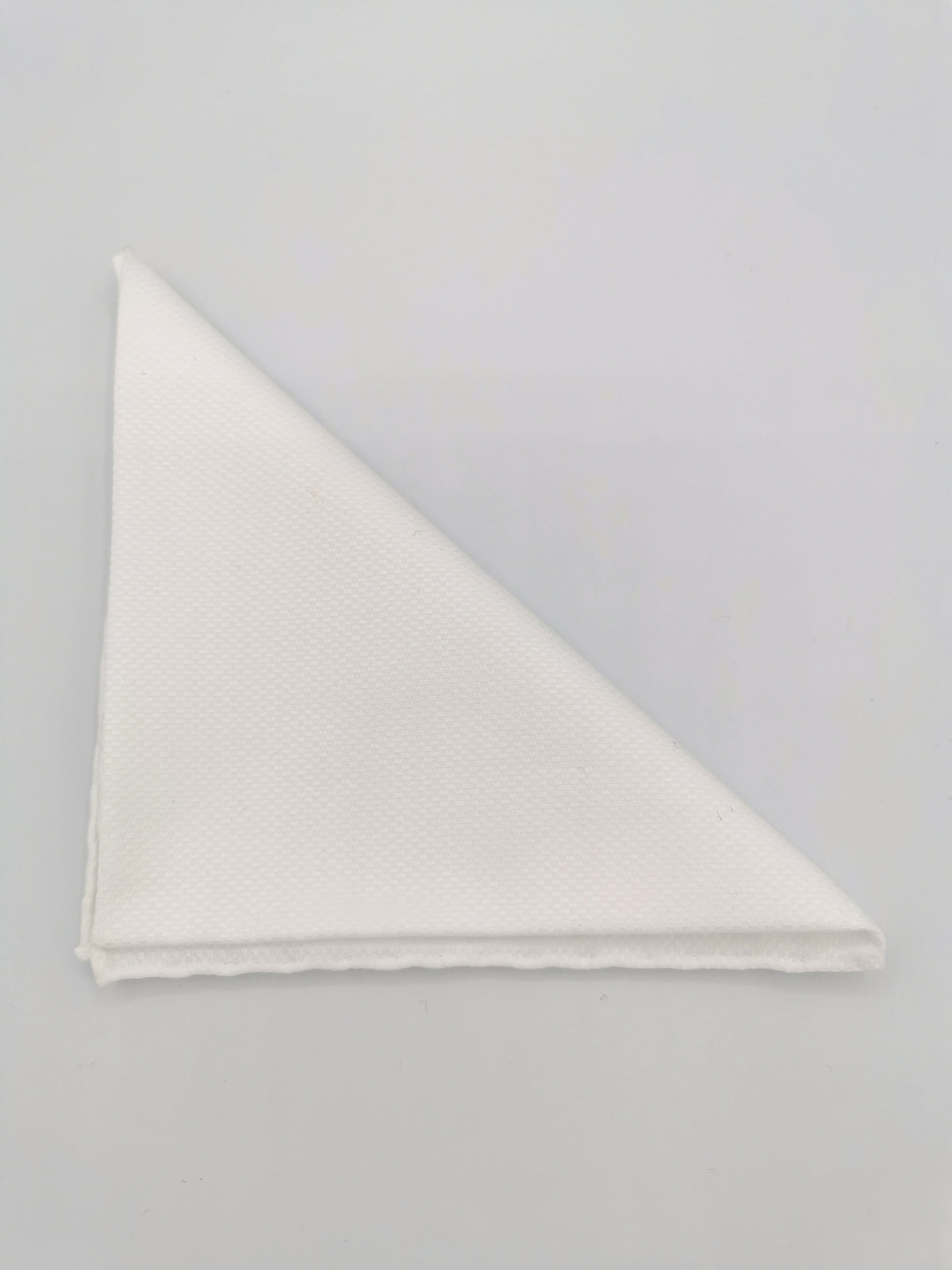 White cotton pocket square with checkerboard pattern