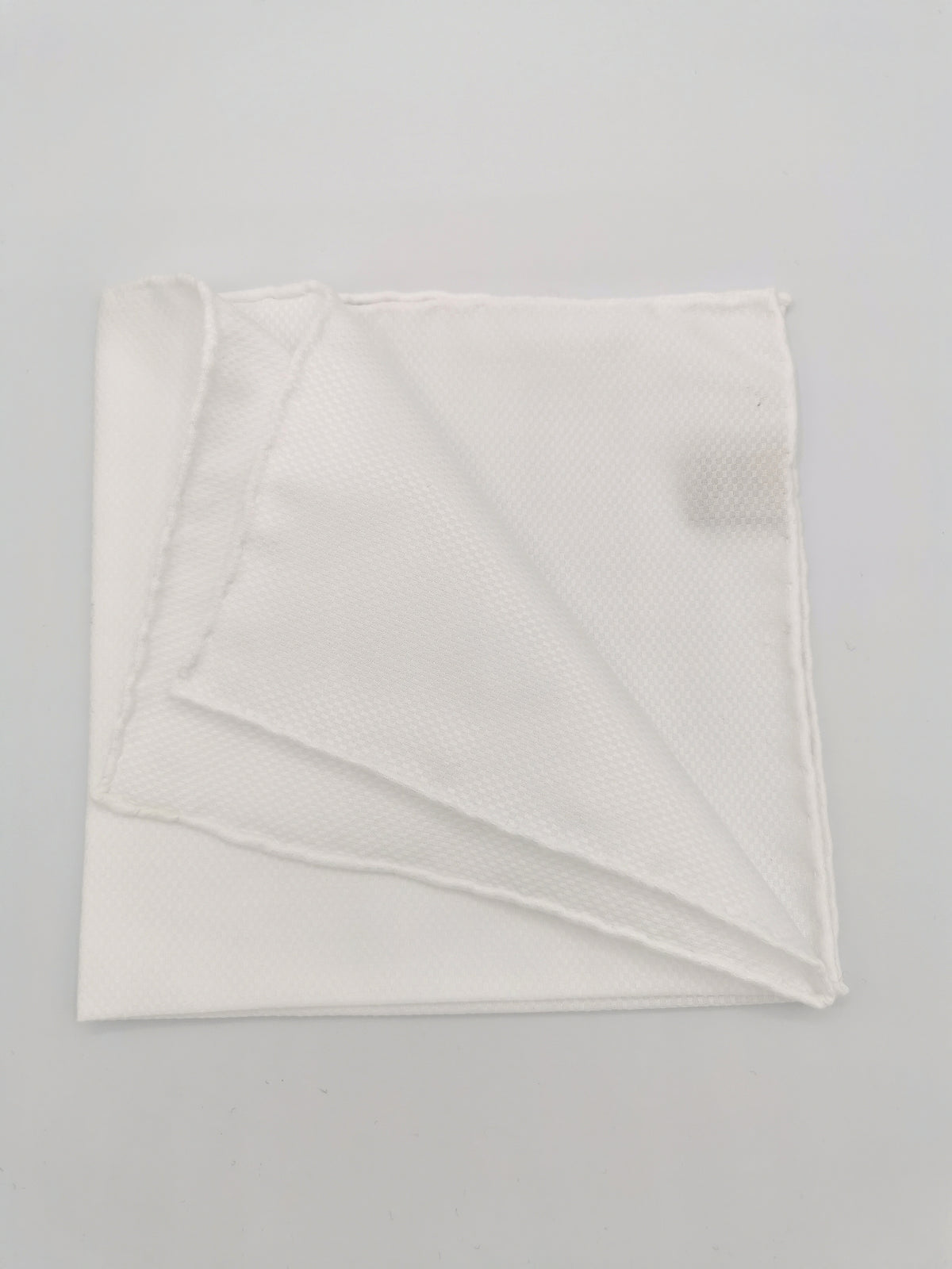 White cotton pocket square with checkerboard pattern