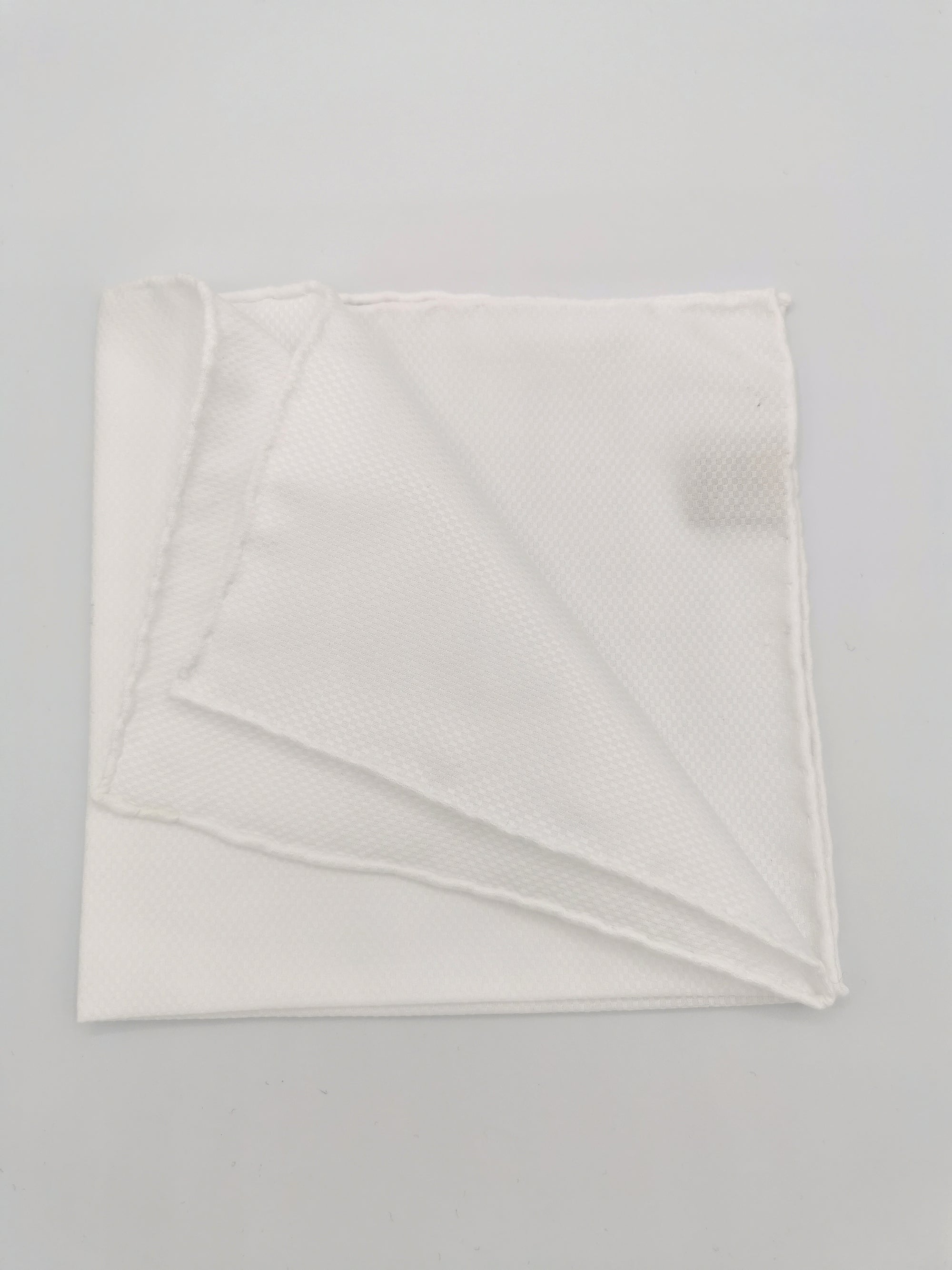 Pochette en coton blanc avec motif en damier