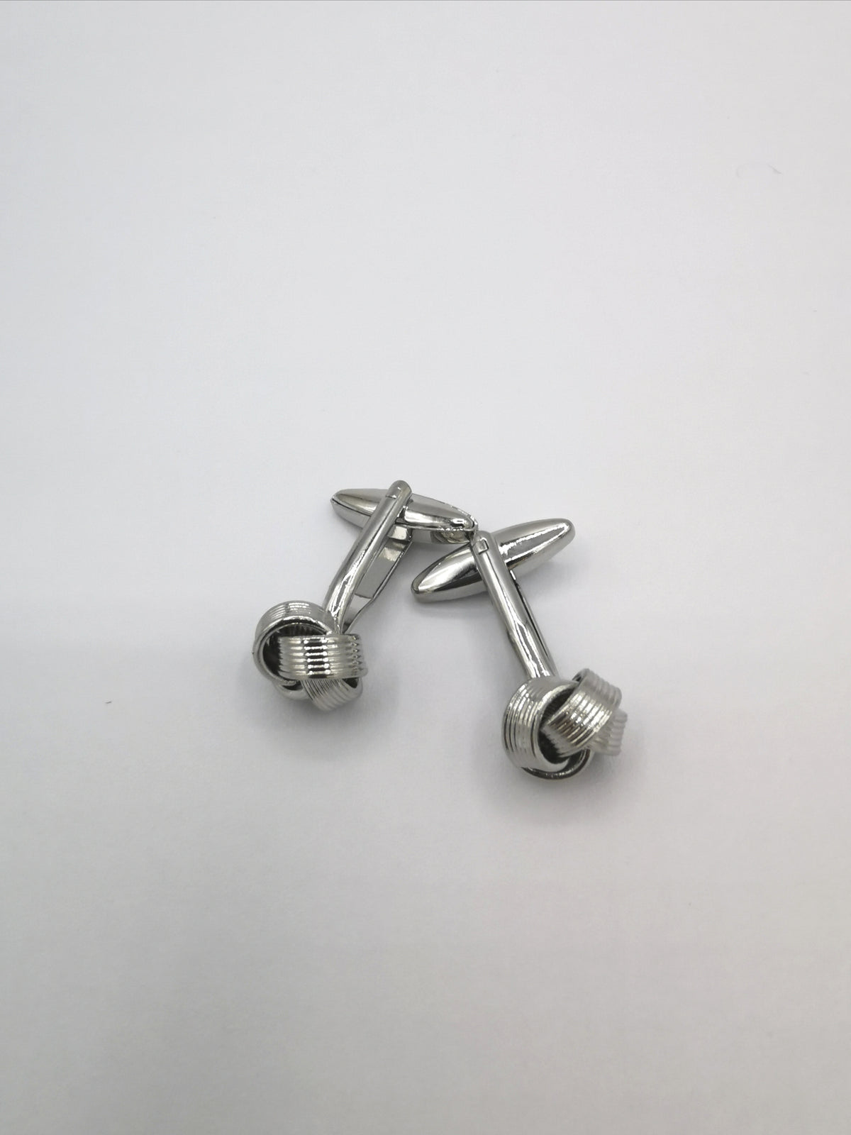 &lt;p id=&quot;isPasted&quot;&gt;ENGRAVED METAL KNOT CUFFLINKS&lt;/p&gt;