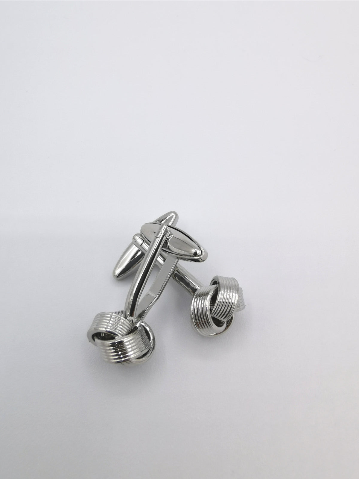 &lt;p id=&quot;isPasted&quot;&gt;ENGRAVED METAL KNOT CUFFLINKS&lt;/p&gt;