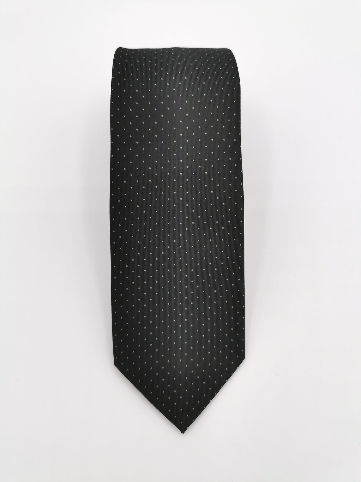 Black silk tie with white polka dots