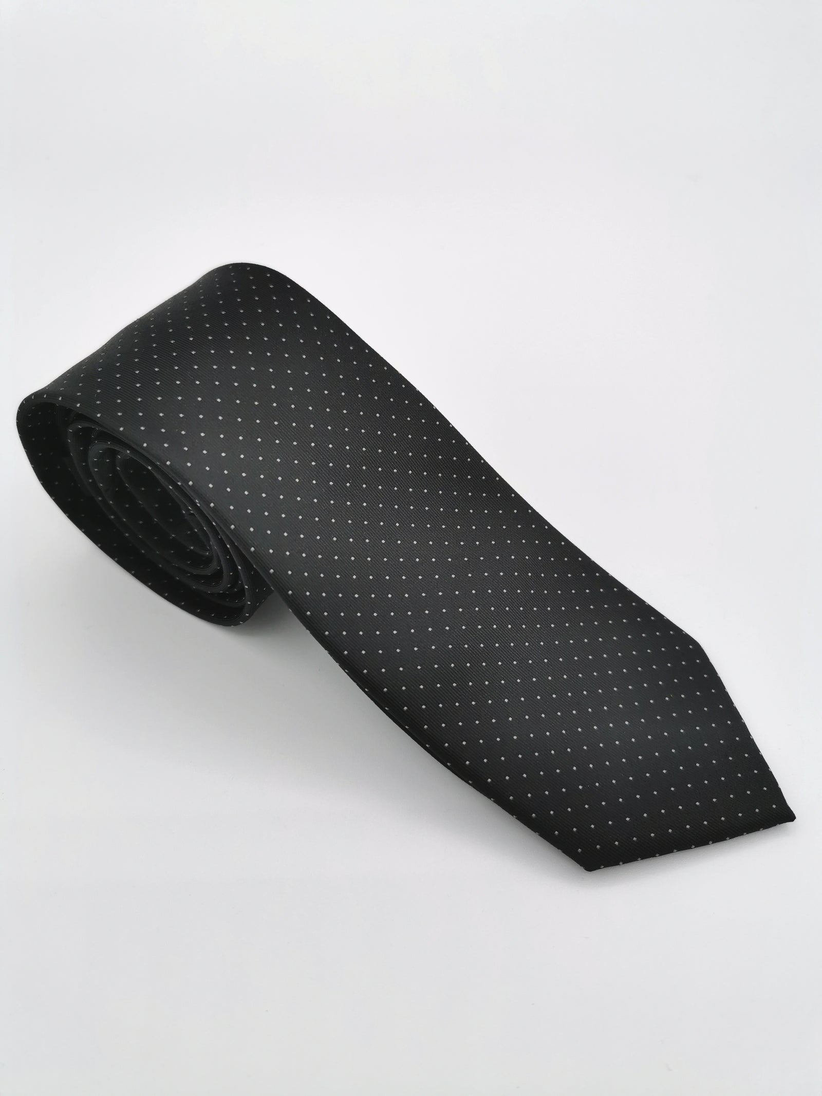 Black silk tie with white polka dots