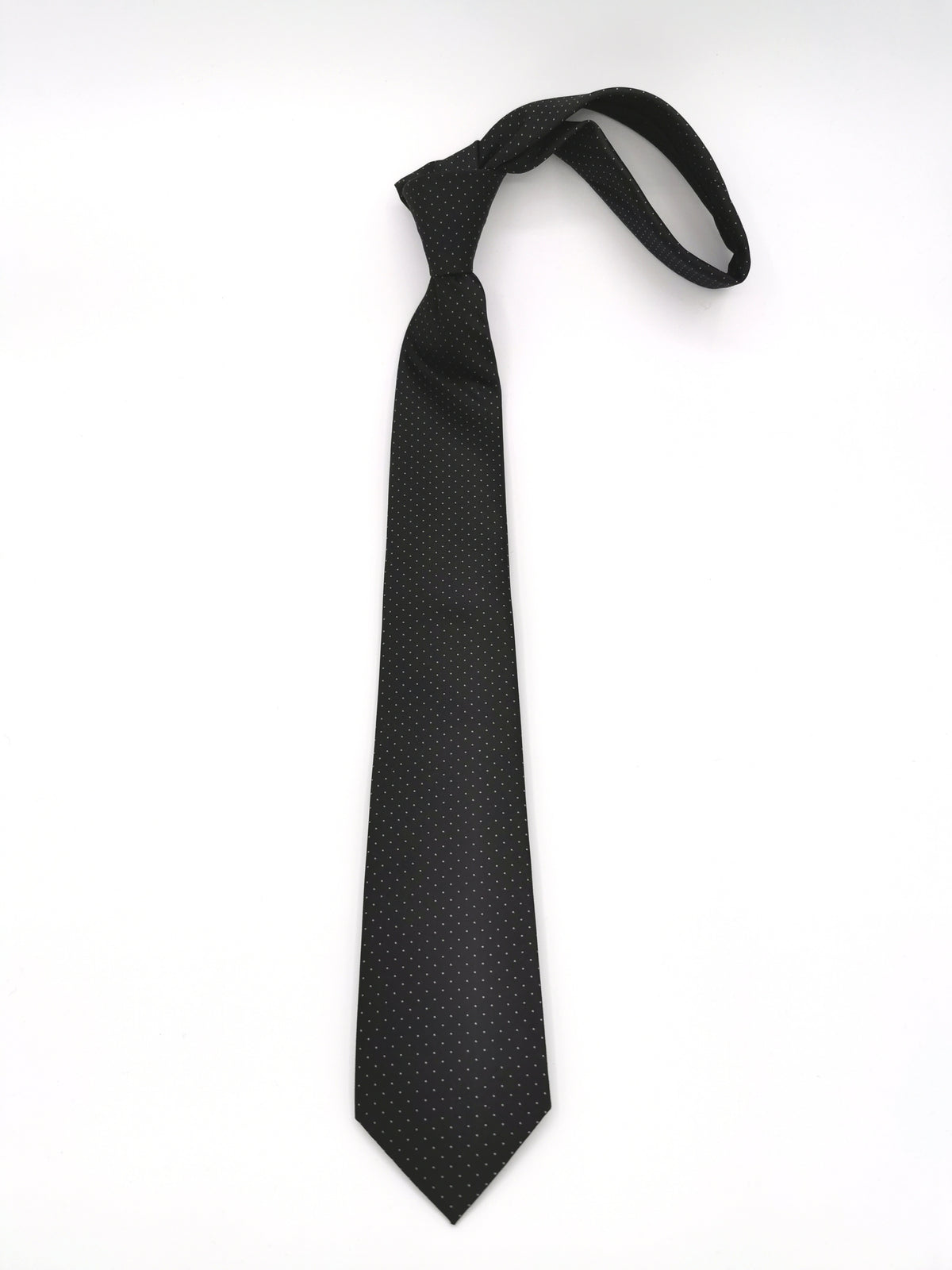 Black silk tie with white polka dots