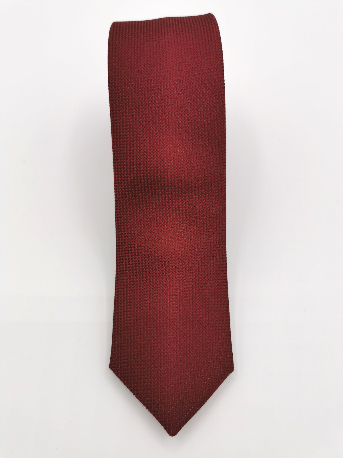 Thin red silk tie