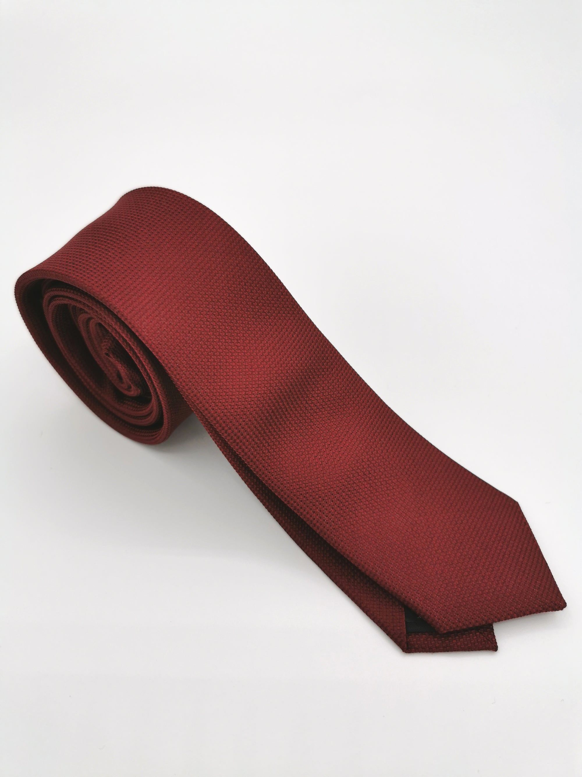 Thin red silk tie