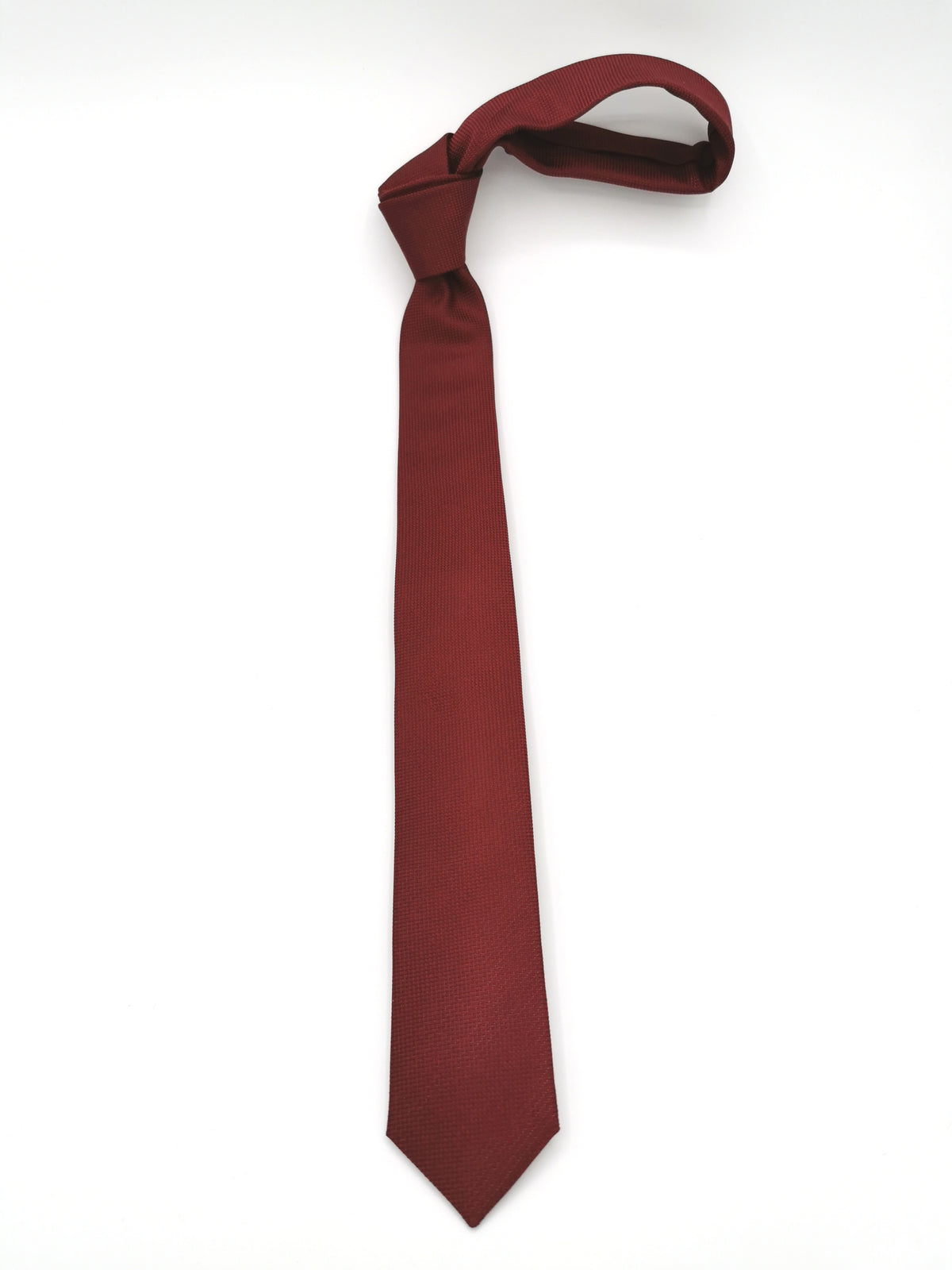 Thin red silk tie