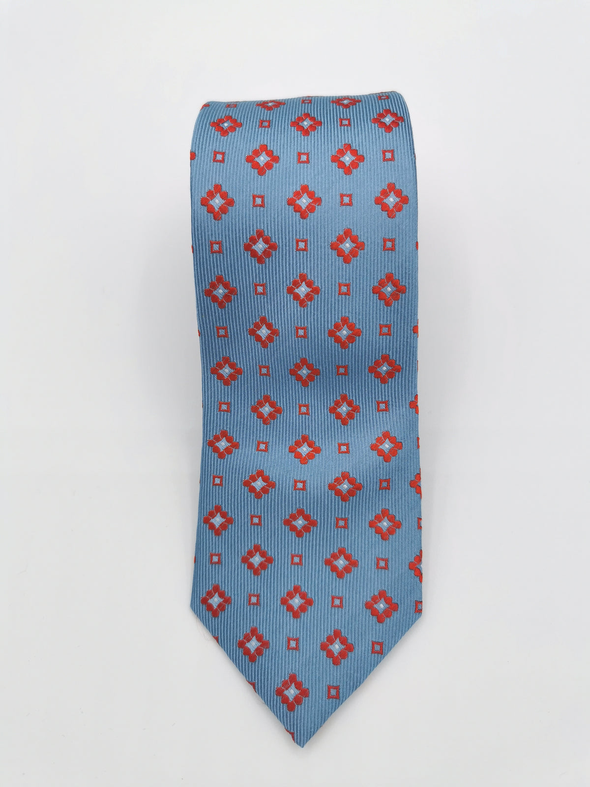 Sky blue silk tie with orange flowers
