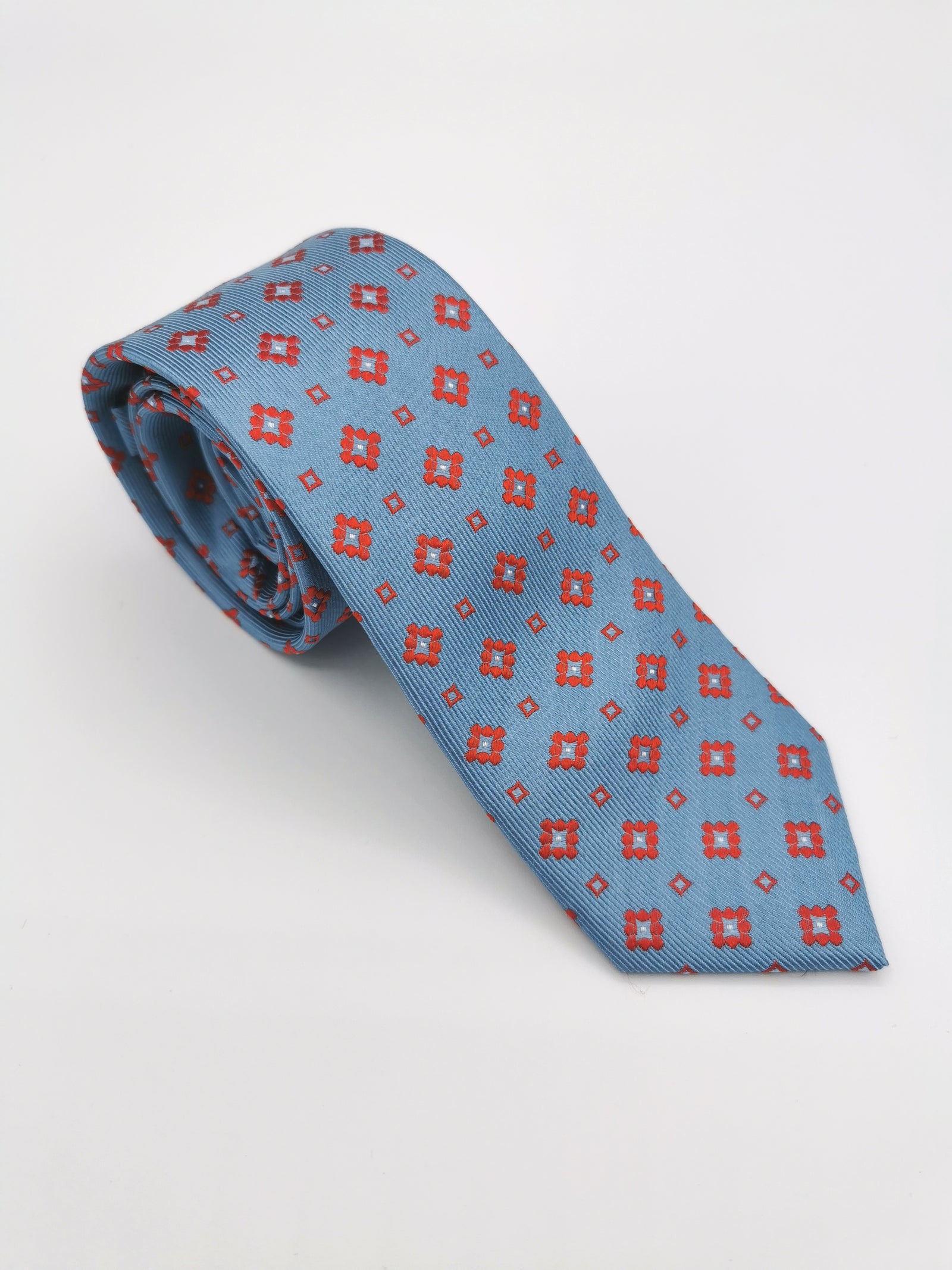 Sky blue silk tie with orange flowers