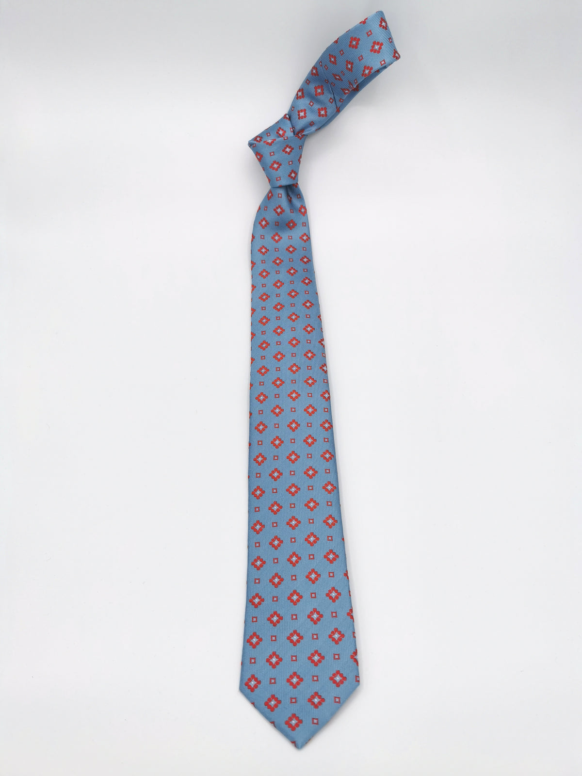 Sky blue silk tie with orange flowers