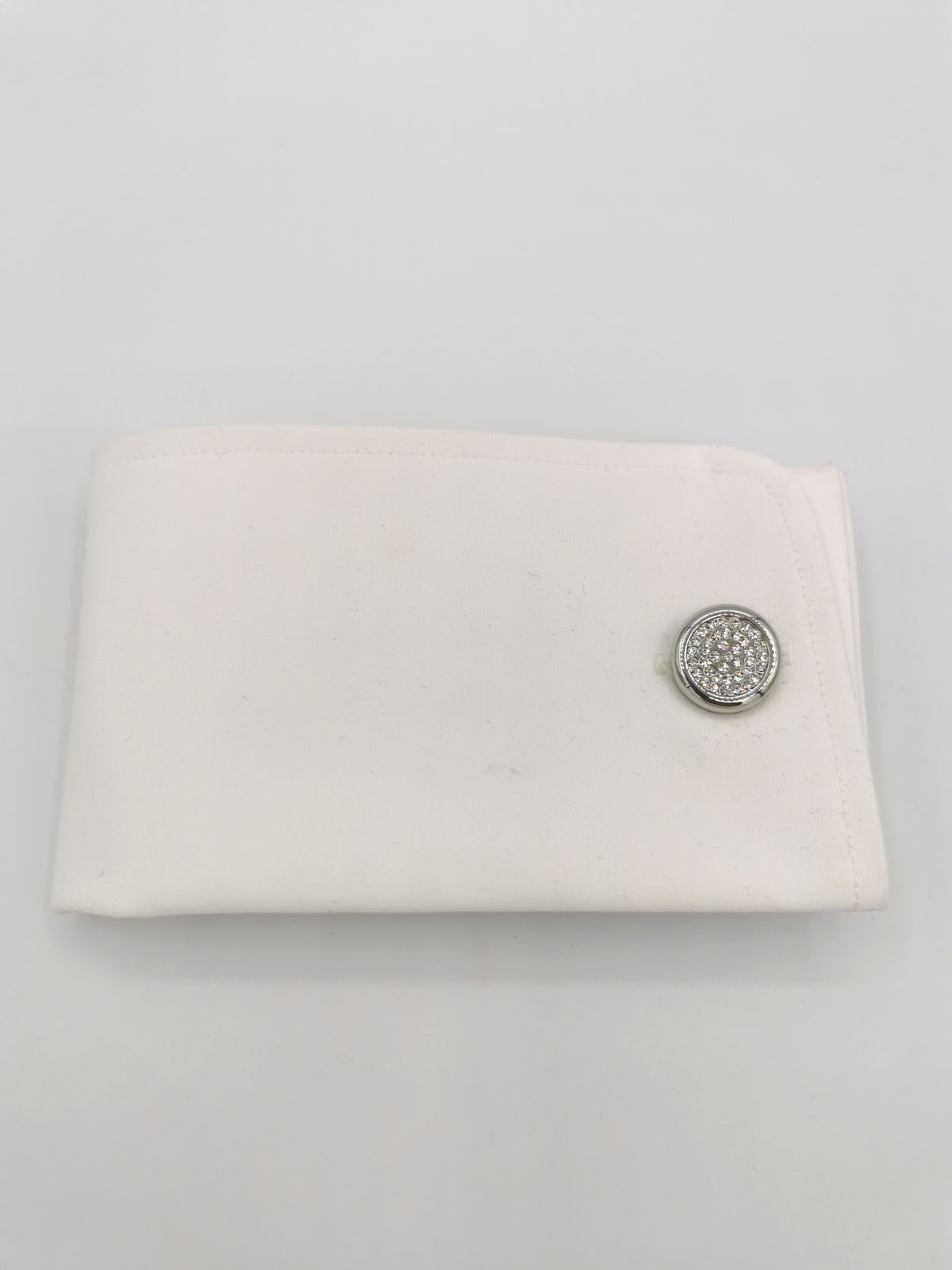 &lt;p&gt;Crystal cufflinks&lt;/p&gt;