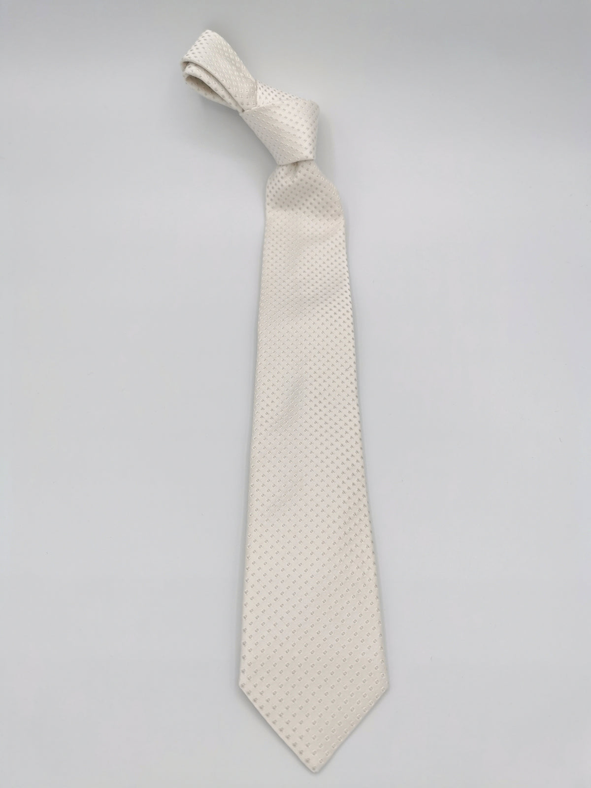 Ferala ivory silk tie with polka dot pattern